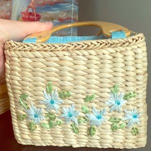 Unique basket woven bag with feminine flowers